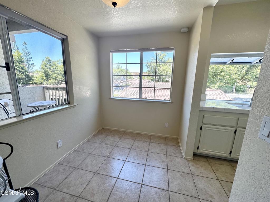 672 Indian Oak Lane, Unit 103 Oak Park, CA 91377 - Photo 6 of 34 a view of an empty room with a window