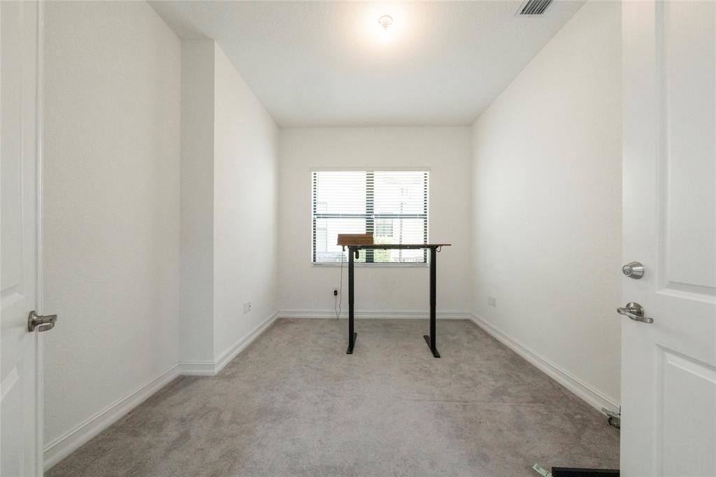11843 Southwest 13th Court Pembroke Pines, FL 33025 - Photo 13 of 37 a view of a hallway with front door