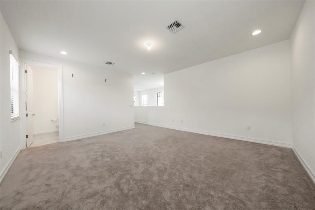 11843 Southwest 13th Court Pembroke Pines, FL 33025 - Photo 22 of 37 an empty room with windows