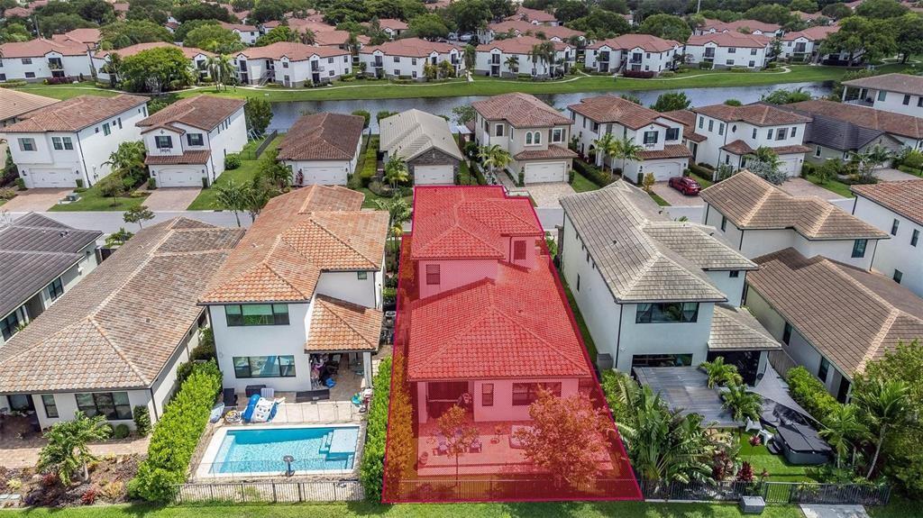 11843 Southwest 13th Court Pembroke Pines, FL 33025 - Photo 31 of 37 an aerial view of residential houses with outdoor space and parking