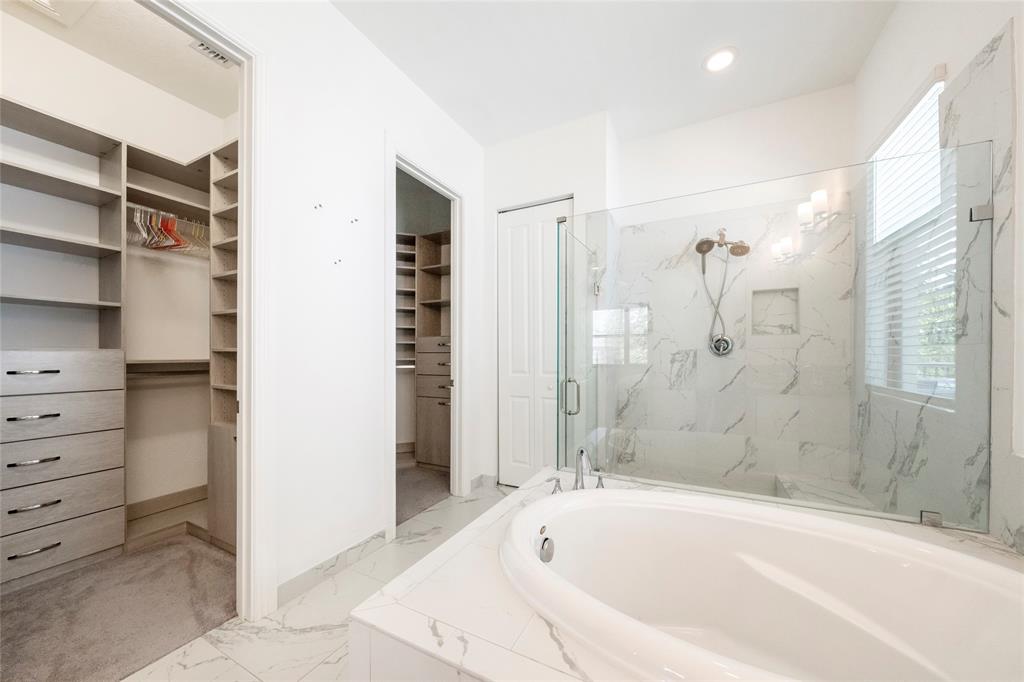 11843 Southwest 13th Court Pembroke Pines, FL 33025 - Photo 5 of 37 a bathroom with a bathtub and a shower