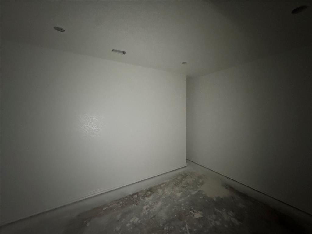 28296 Spring Valley Drive Kemp, TX 75143 - Photo 30 of 32 Unfurnished room featuring unfinished concrete floors