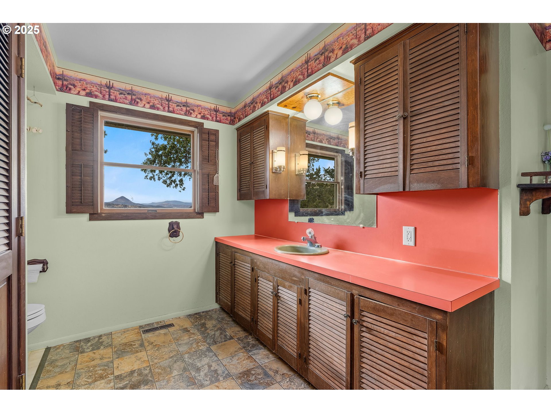 19369 Highway 26 Mitchell, OR 97750 - Photo 24 of 48 a kitchen with a sink and cabinets