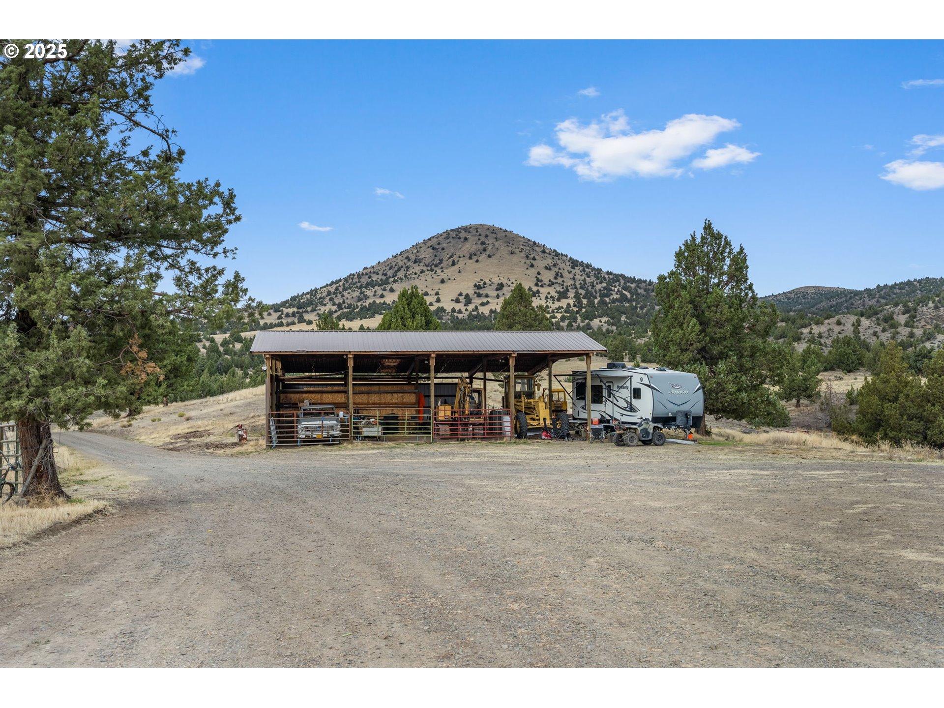 19369 Highway 26 Mitchell, OR 97750 - Photo 34 of 48 a view of a house with a patio