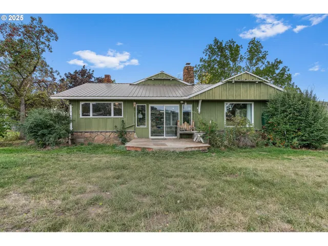a view of a house with a garden
