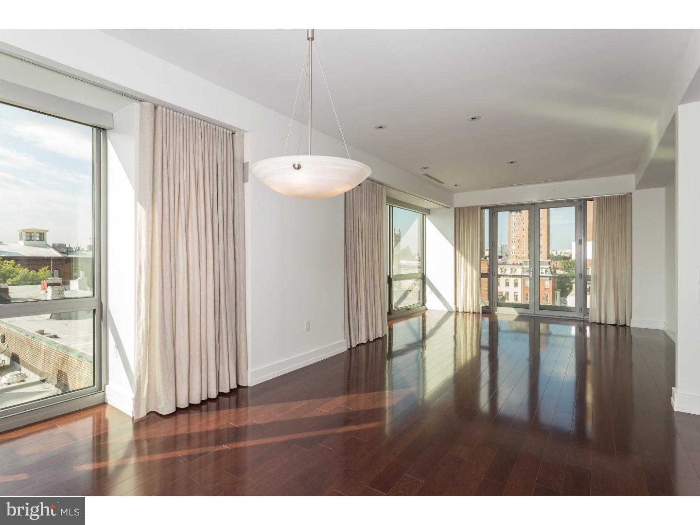 1706 Rittenhouse Square, Unit 402 Philadelphia, PA 19103 - Photo 12 of 17 a view interior of a house wooden floor and windows