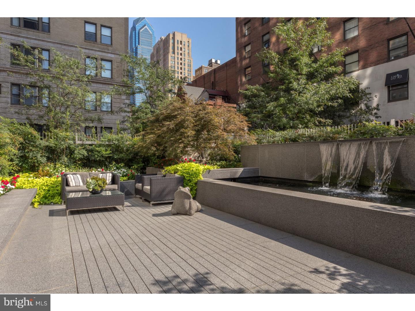 1706 Rittenhouse Square, Unit 402 Philadelphia, PA 19103 - Photo 3 of 17 a view of a swimming pool with a patio
