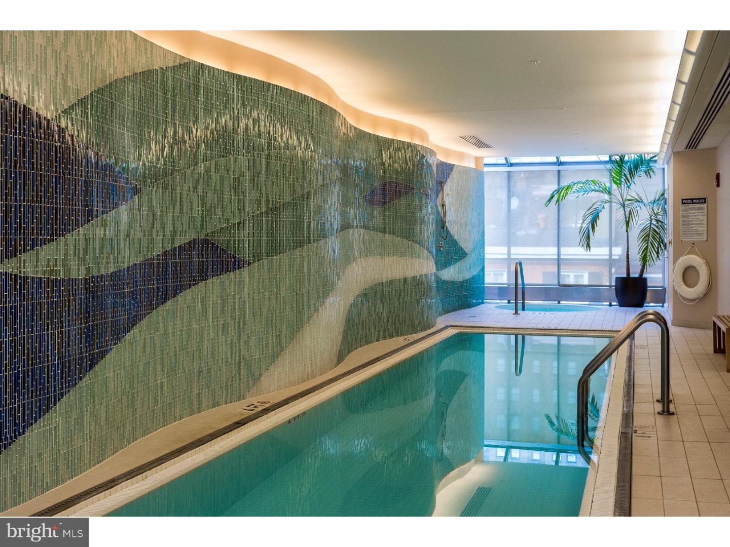 1706 Rittenhouse Square, Unit 402 Philadelphia, PA 19103 - Photo 5 of 17 a view of a swimming pool with a patio