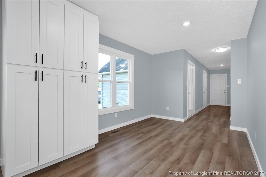 1163 Hoke Loop Road Fayetteville, NC 28314 - Photo 16 of 34 a view of entryway with wooden floor