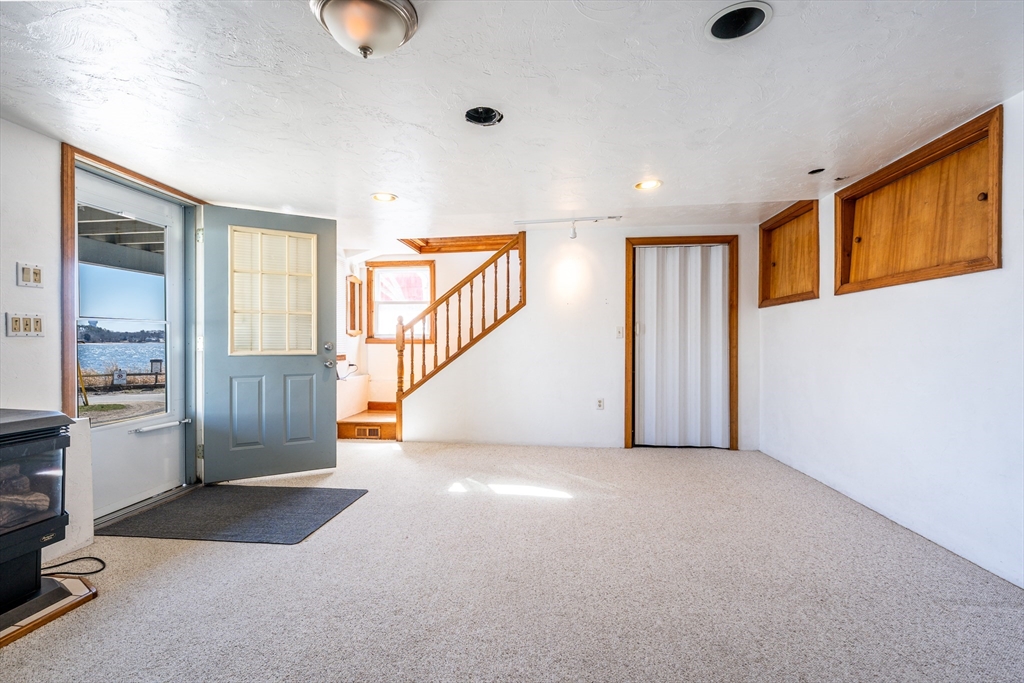 25 Nautical Way, Unit E Bourne, MA 02532 - Photo 12 of 25 a view of an entryway with wooden floor