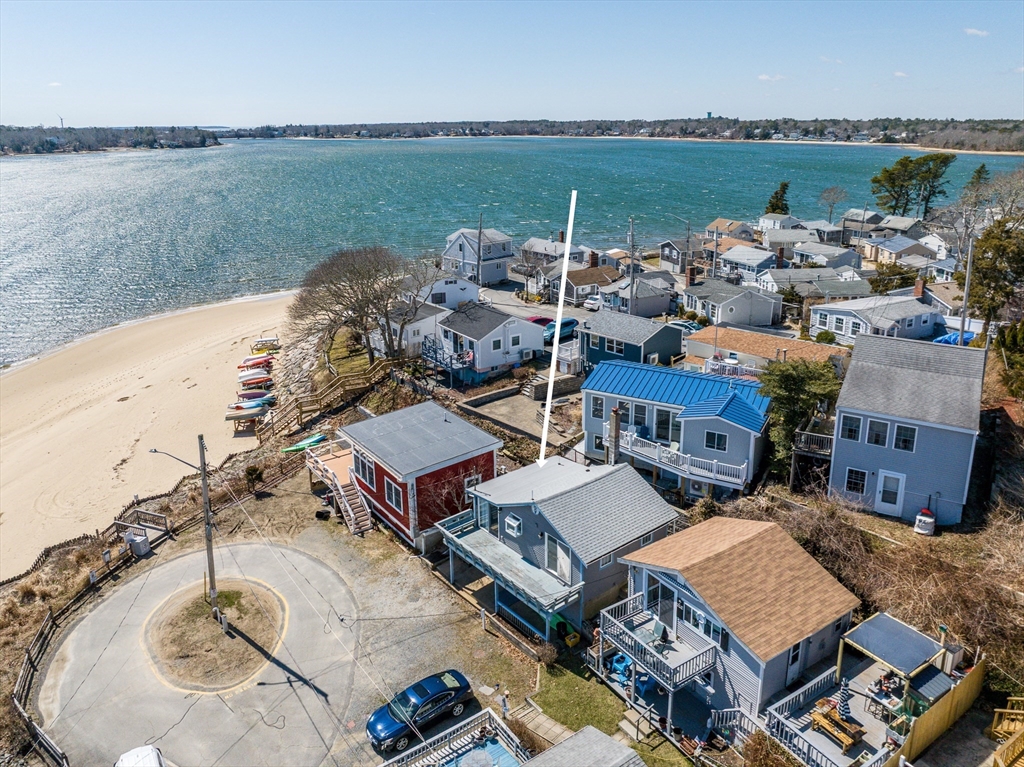 25 Nautical Way, Unit E Bourne, MA 02532 - Photo 2 of 25 an aerial view of a house with outdoor space and lake view