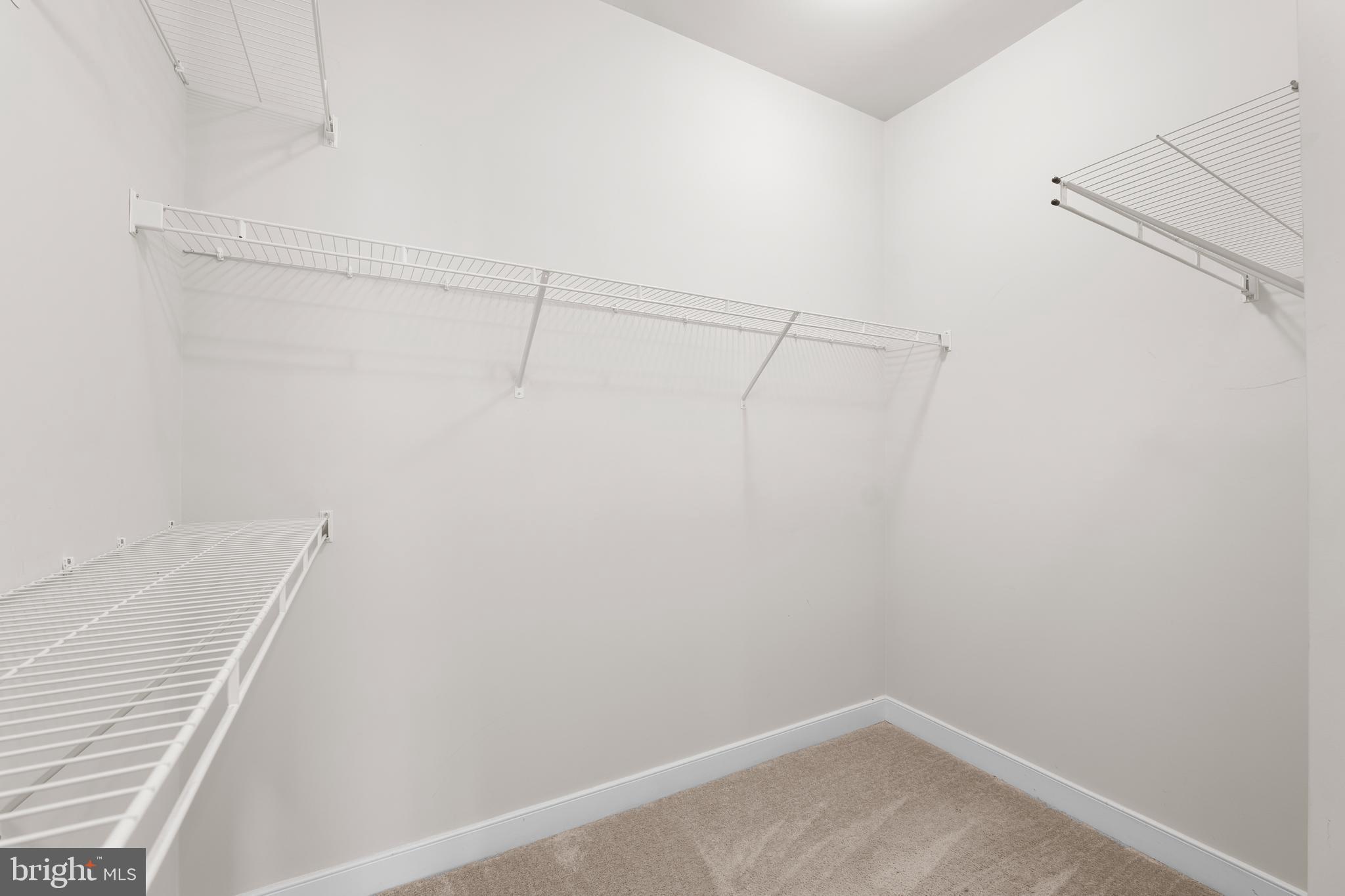 9780 Fields Road Gaithersburg, MD 20878 - Photo 17 of 37 a view of a room with racks on the wall