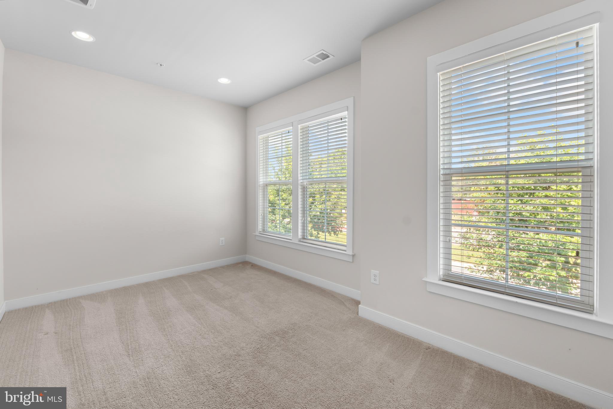 9780 Fields Road Gaithersburg, MD 20878 - Photo 22 of 37 a view of an empty room with a window