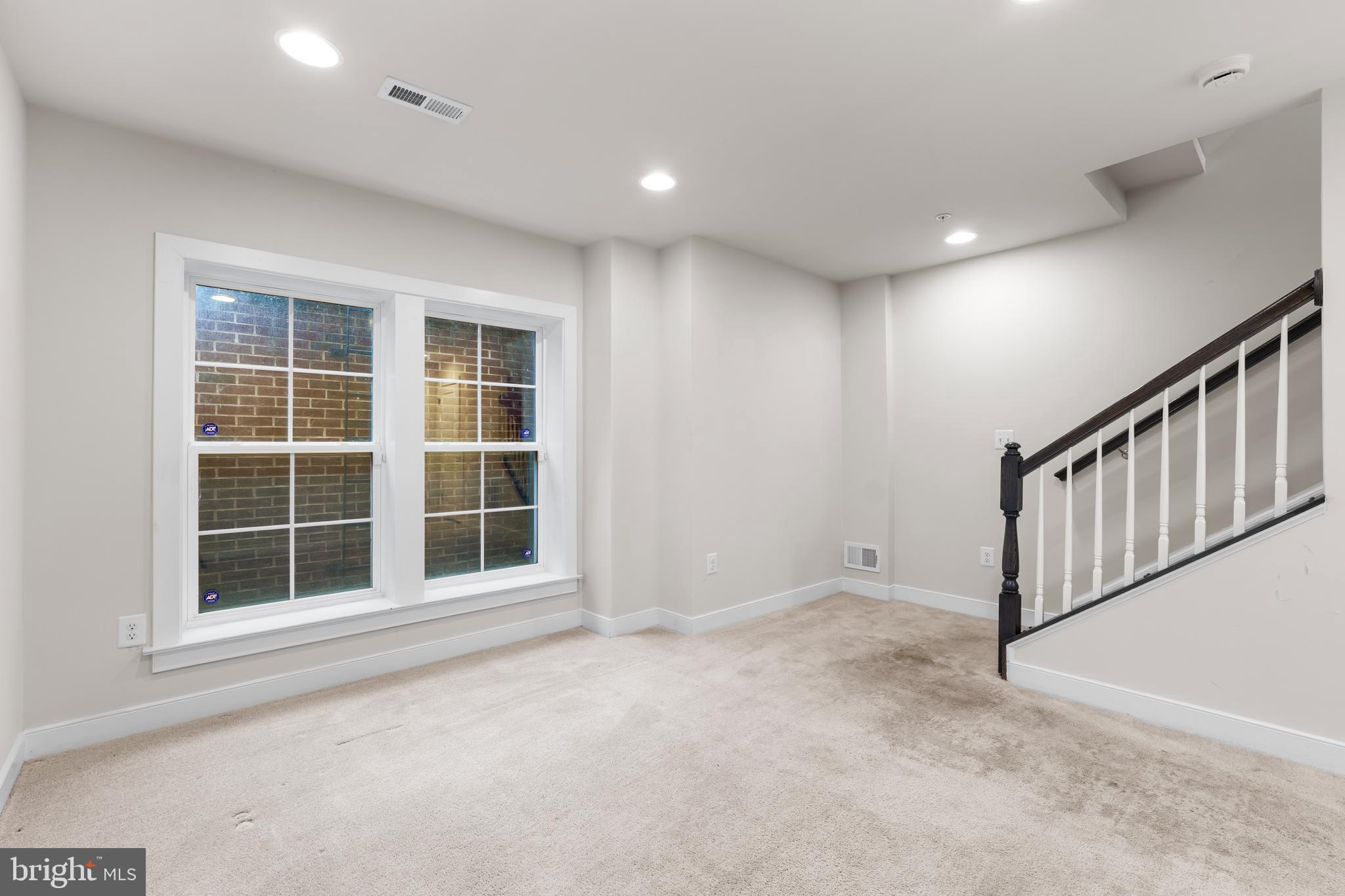9780 Fields Road Gaithersburg, MD 20878 - Photo 32 of 37 a view of an empty room with a window
