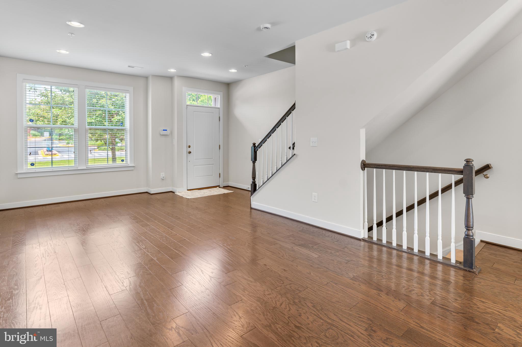9780 Fields Road Gaithersburg, MD 20878 - Photo 7 of 37 a view of an entryway with wooden floor