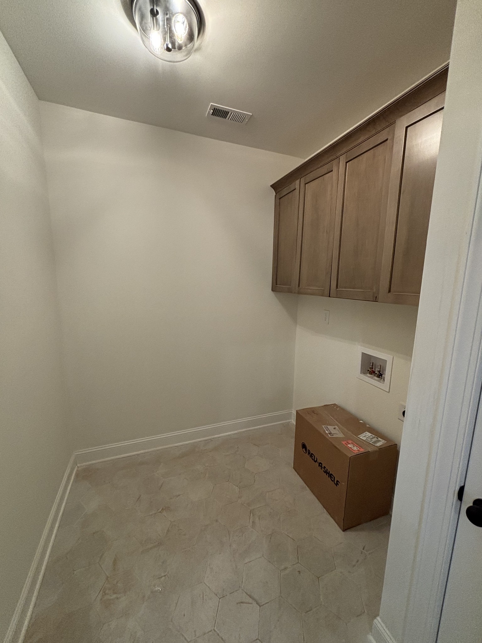 0 Cascade Drive Winchester, TN 37398 - Photo 18 of 33 a room with a wooden cabinets and a window