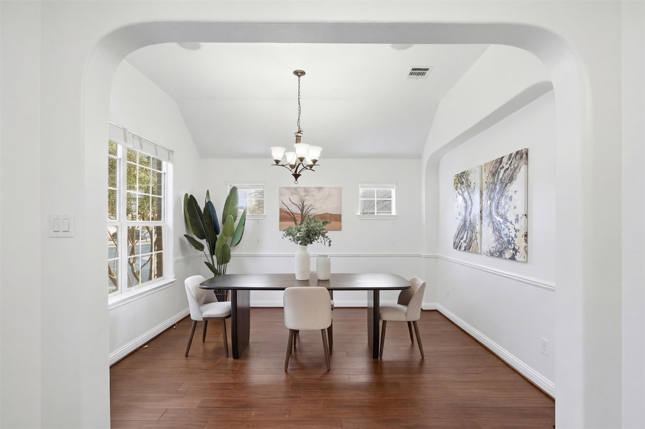 13600 Hymeadow Circle Austin, TX 78729 - Photo 14 of 34 a view of a dining room with furniture window and wooden floor