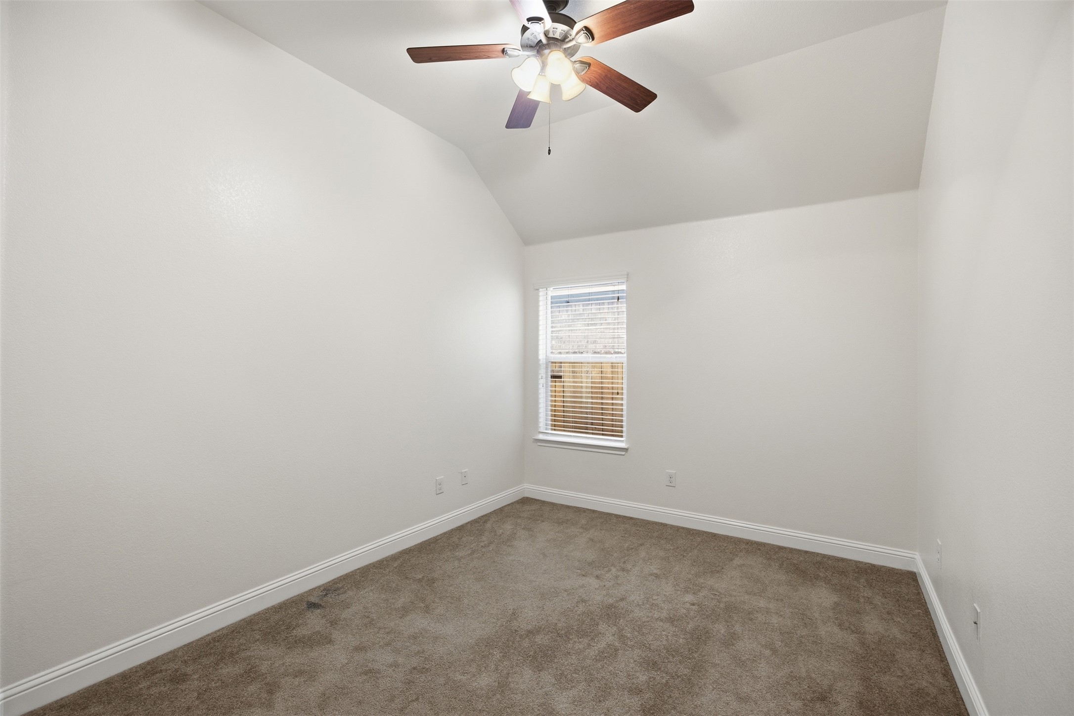 13600 Hymeadow Circle Austin, TX 78729 - Photo 26 of 34 an empty room with a window and a fan