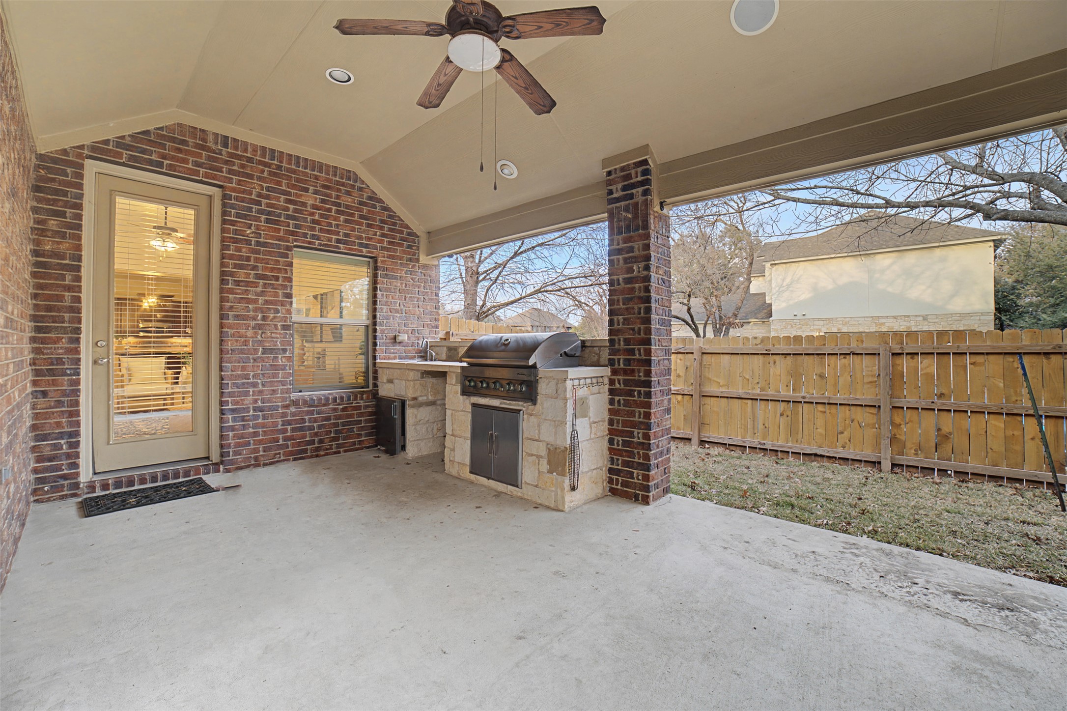 13600 Hymeadow Circle Austin, TX 78729 - Photo 28 of 34 a view of a livingroom with an empty space and door