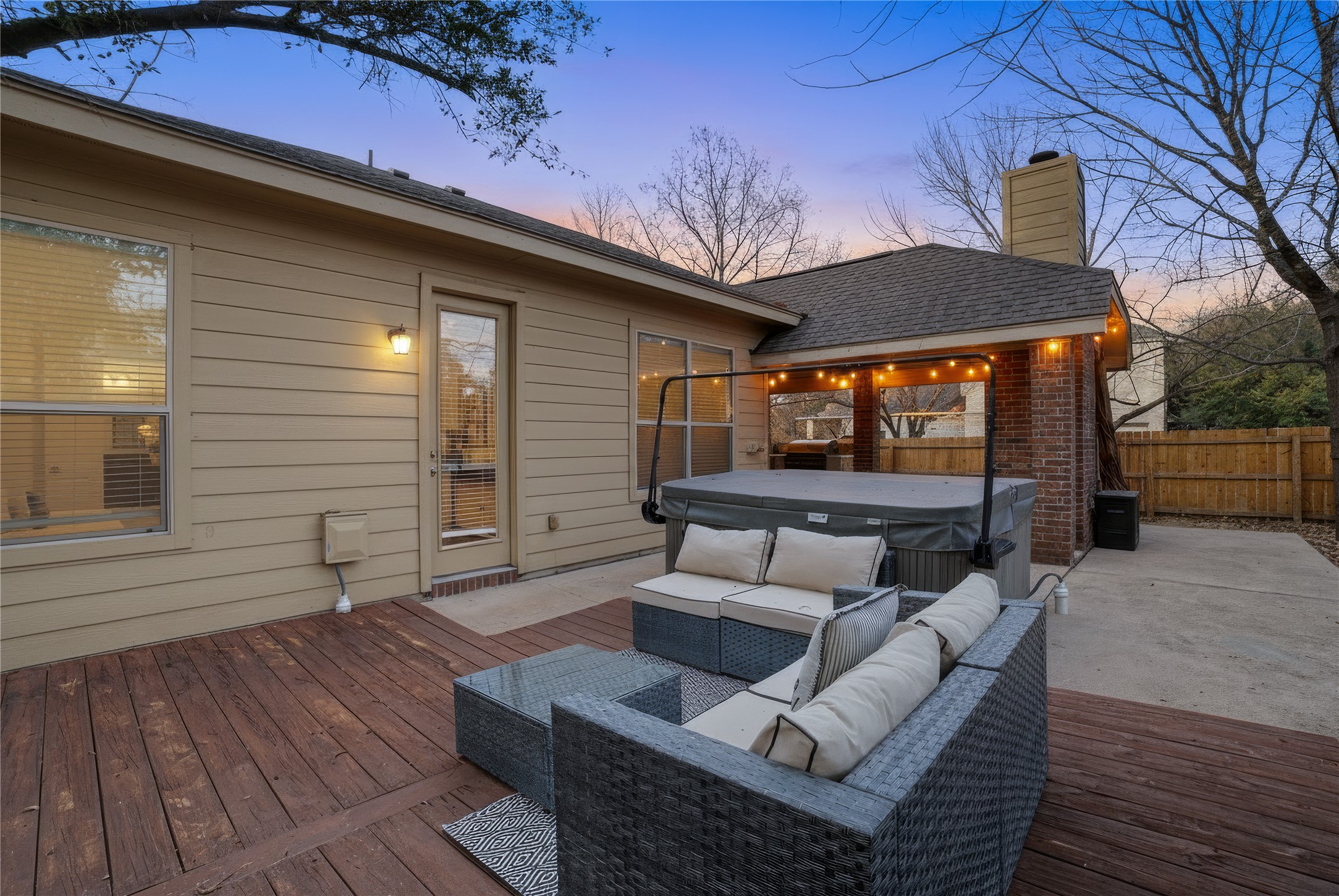 13600 Hymeadow Circle Austin, TX 78729 - Photo 30 of 34 a outdoor living space with patio furniture and wooden floor