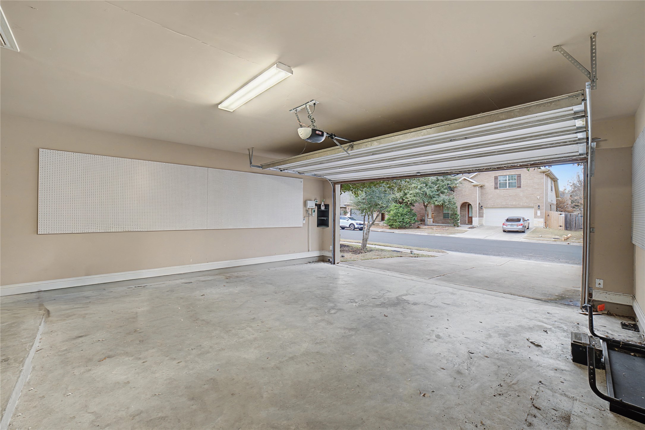13600 Hymeadow Circle Austin, TX 78729 - Photo 33 of 34 a view of a livingroom with wooden floor and a large window