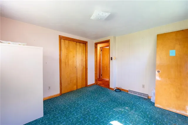 a view of small space with wooden floor