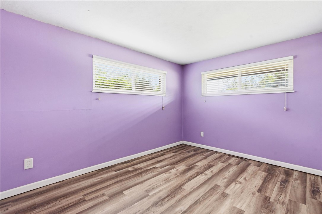 3890 Endover Road Dayton, OH 45439 - Photo 22 of 26 This inviting bedroom features rich hardwood flooring and ample natural light.