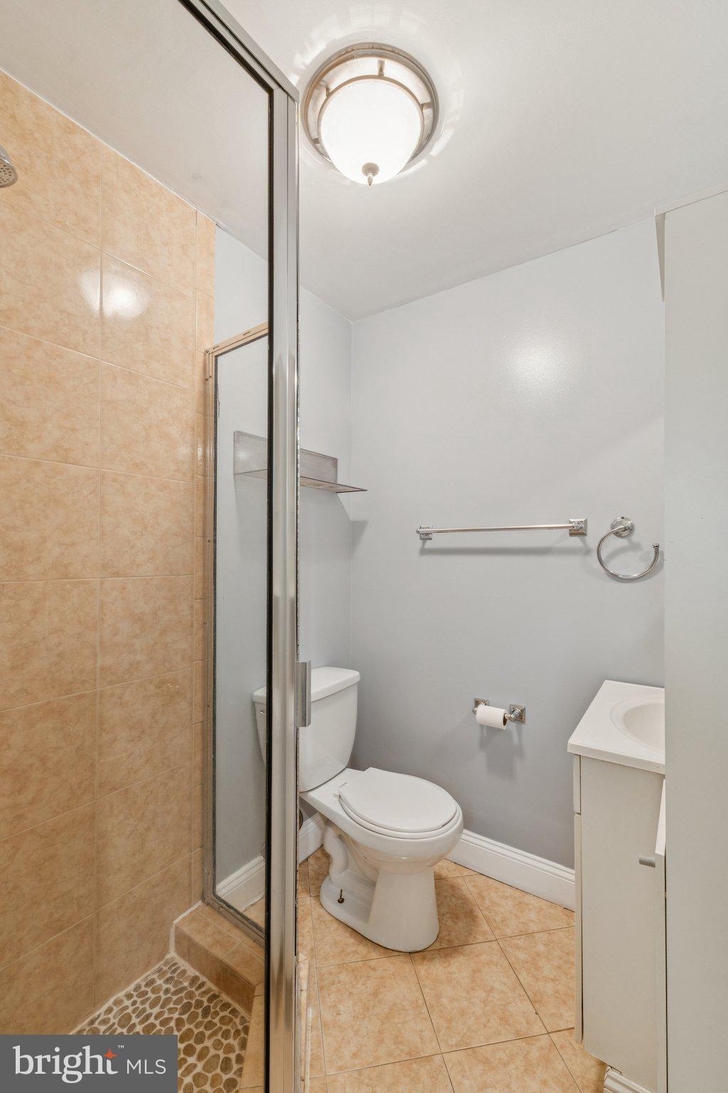 1440 Fairmont Street Northwest, Unit 1 Washington, DC 20009 - Photo 14 of 21 a bathroom with a toilet and a shower