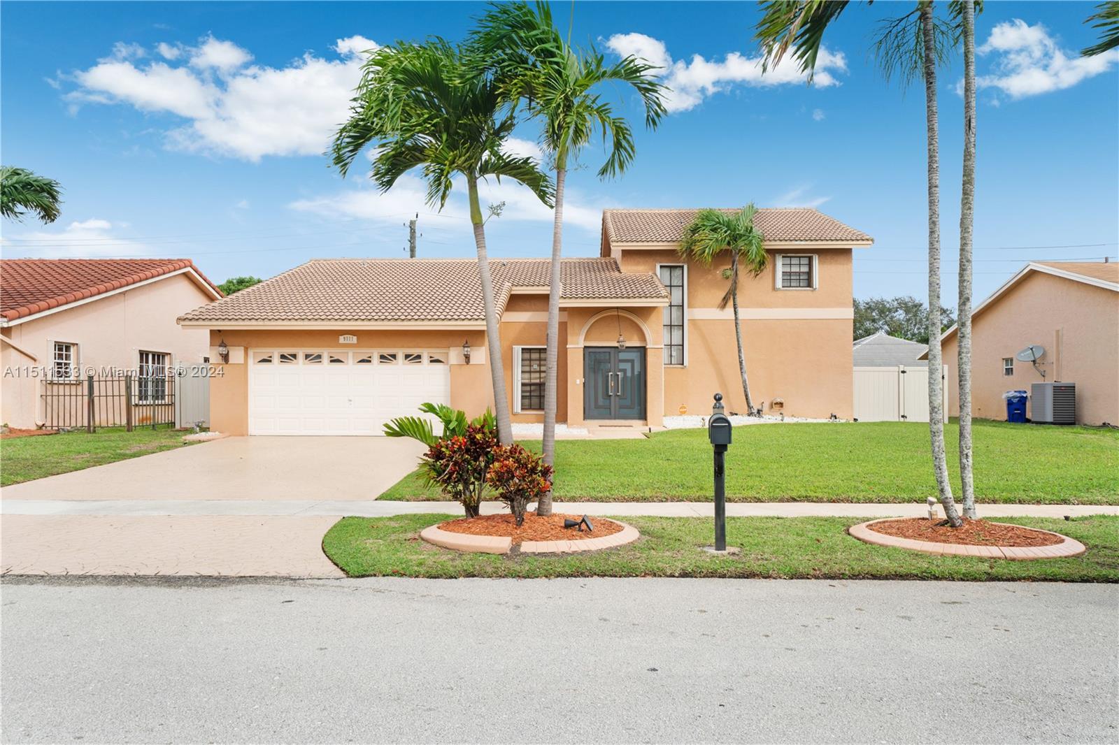 Miramar Miramar, FL 33025 - Photo 1 of 31 a front view of a house with a garden and tree