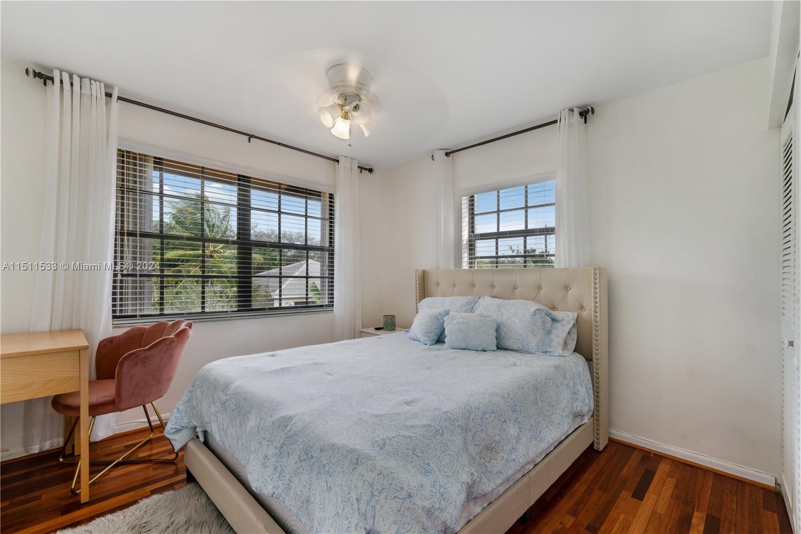 Miramar Miramar, FL 33025 - Photo 24 of 31 a bedroom with a large bed and a window
