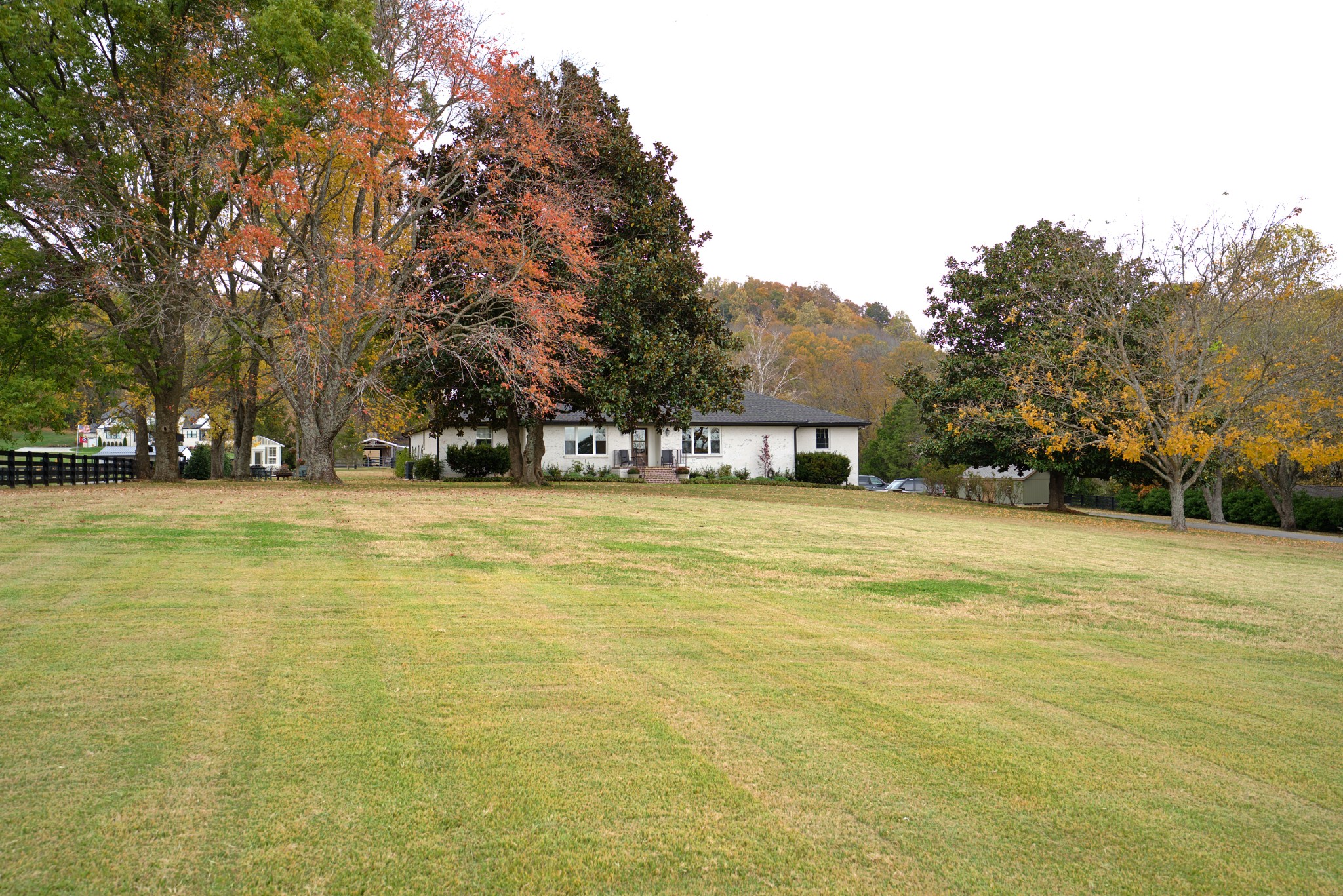 1496 Coleman Road Franklin, TN 37064 - Photo 1 of 82 a house view with swimming pool in front of trees