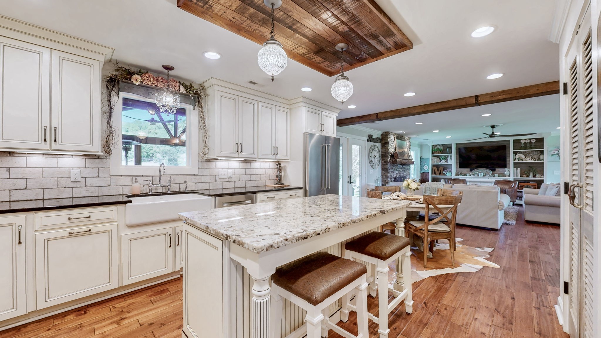 1496 Coleman Road Franklin, TN 37064 - Photo 19 of 82 a kitchen with counter space appliances and a view of living room