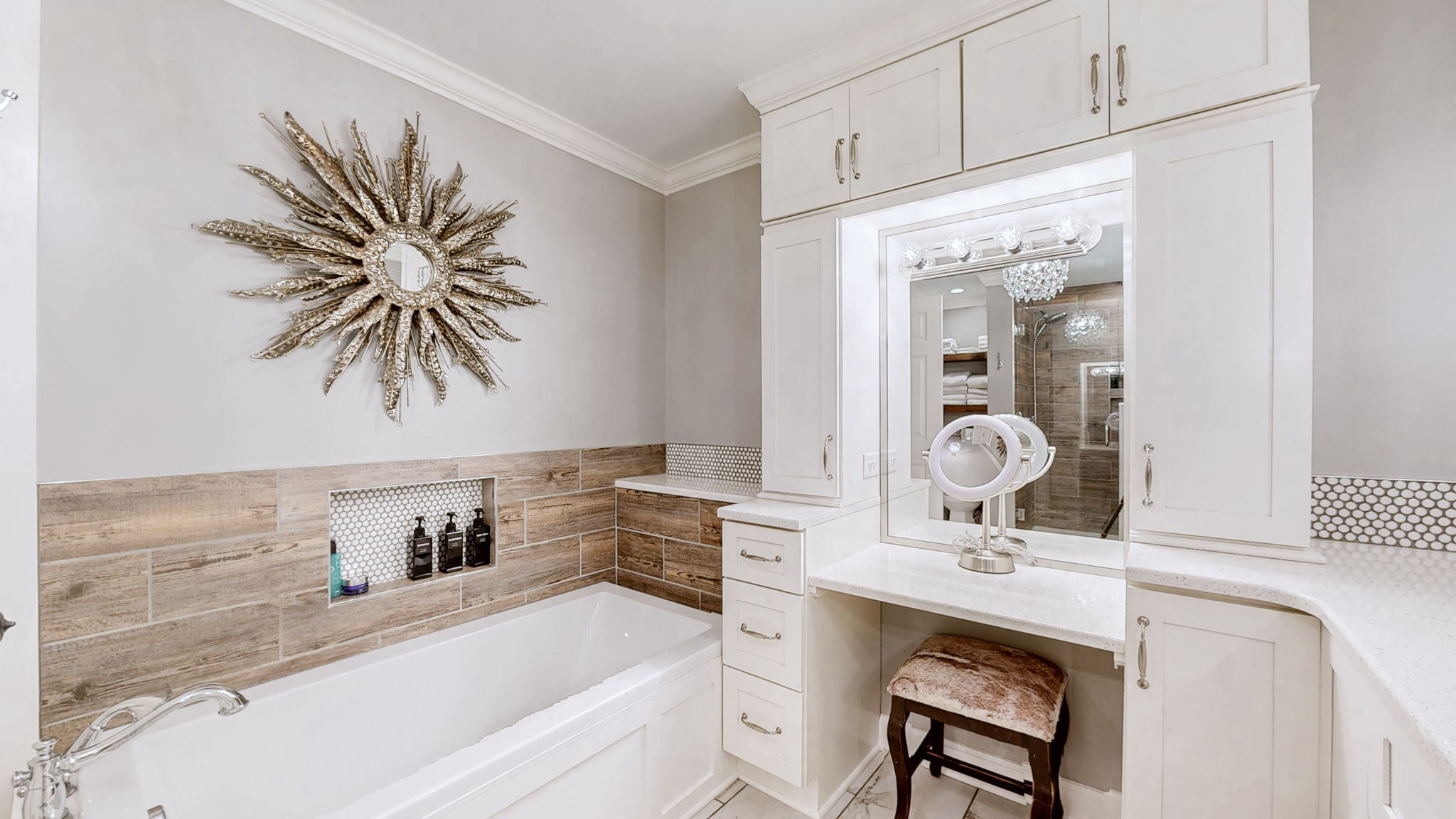 1496 Coleman Road Franklin, TN 37064 - Photo 25 of 82 a bathroom with a sink a mirror and a bathtub