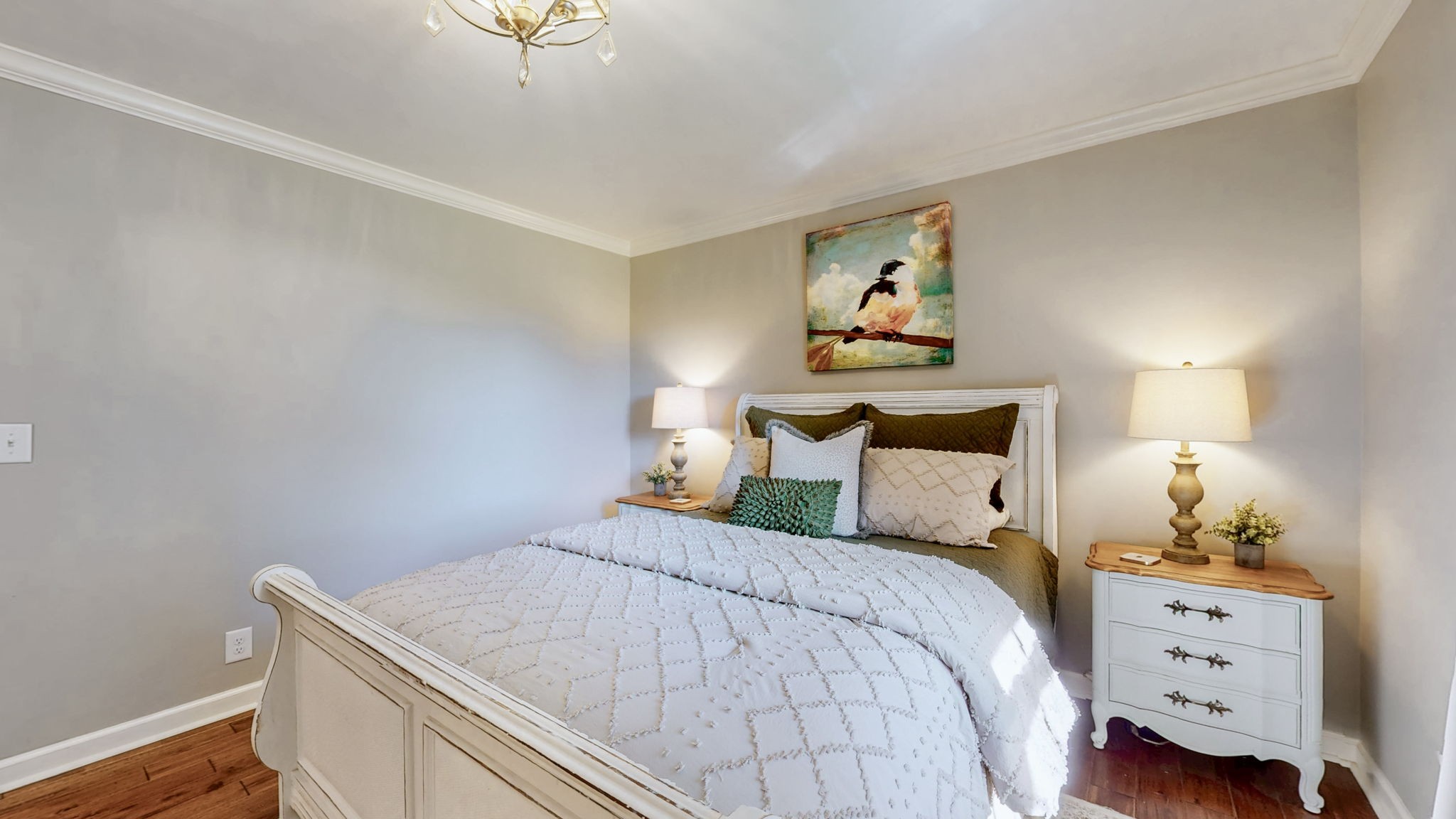 1496 Coleman Road Franklin, TN 37064 - Photo 27 of 82 a bedroom with a bed and a chandelier