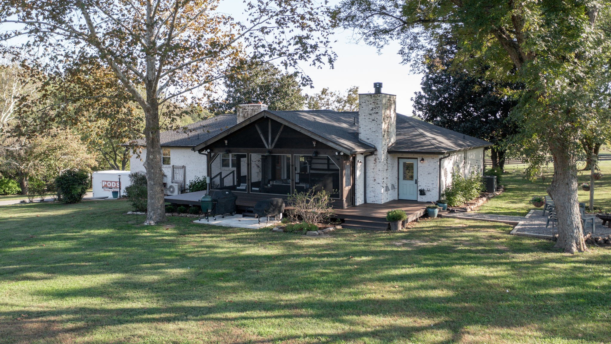 1496 Coleman Road Franklin, TN 37064 - Photo 42 of 82 a front view of a house with garden and trees