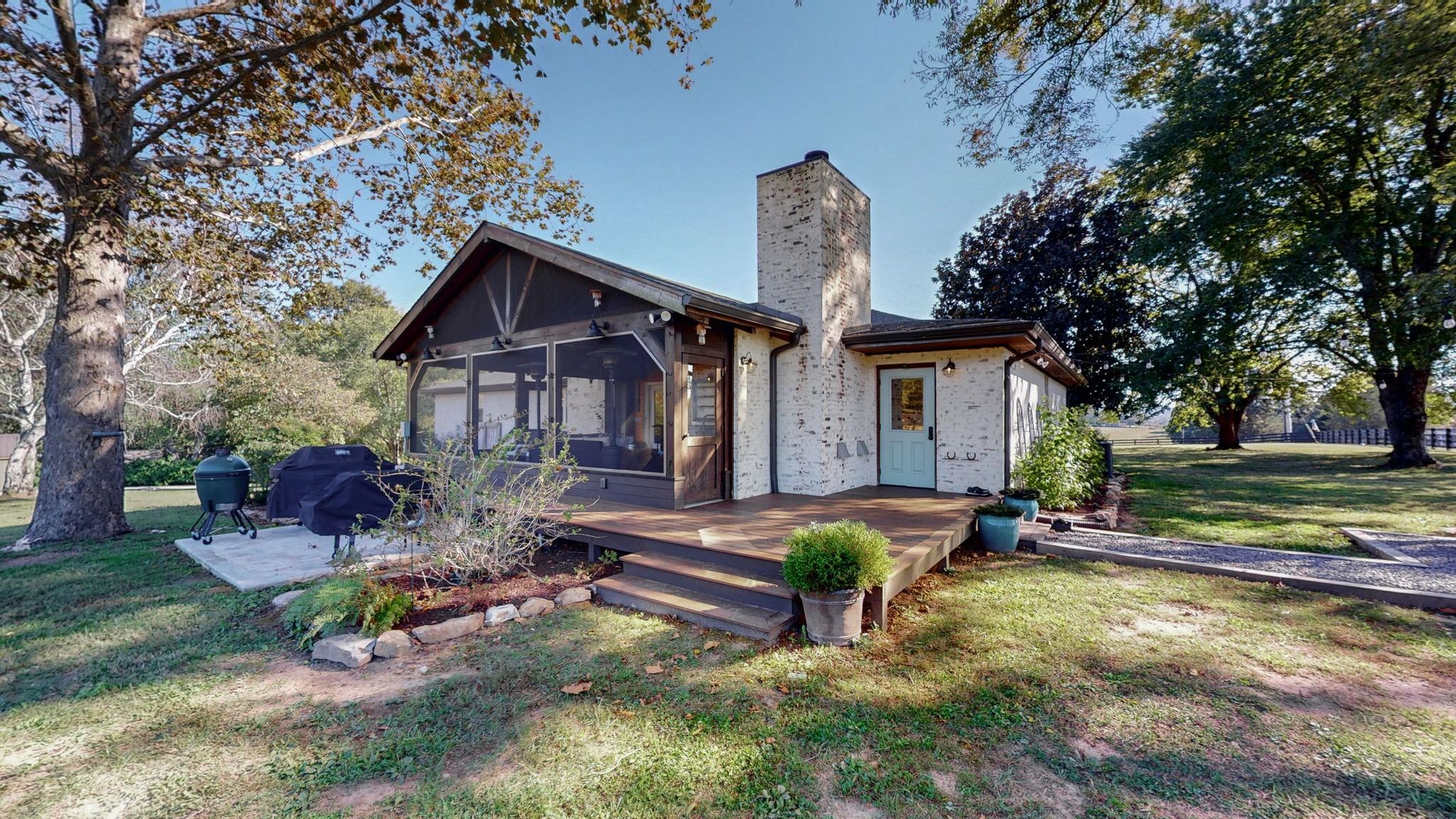 1496 Coleman Road Franklin, TN 37064 - Photo 44 of 82 a view of a house with backyard and sitting area
