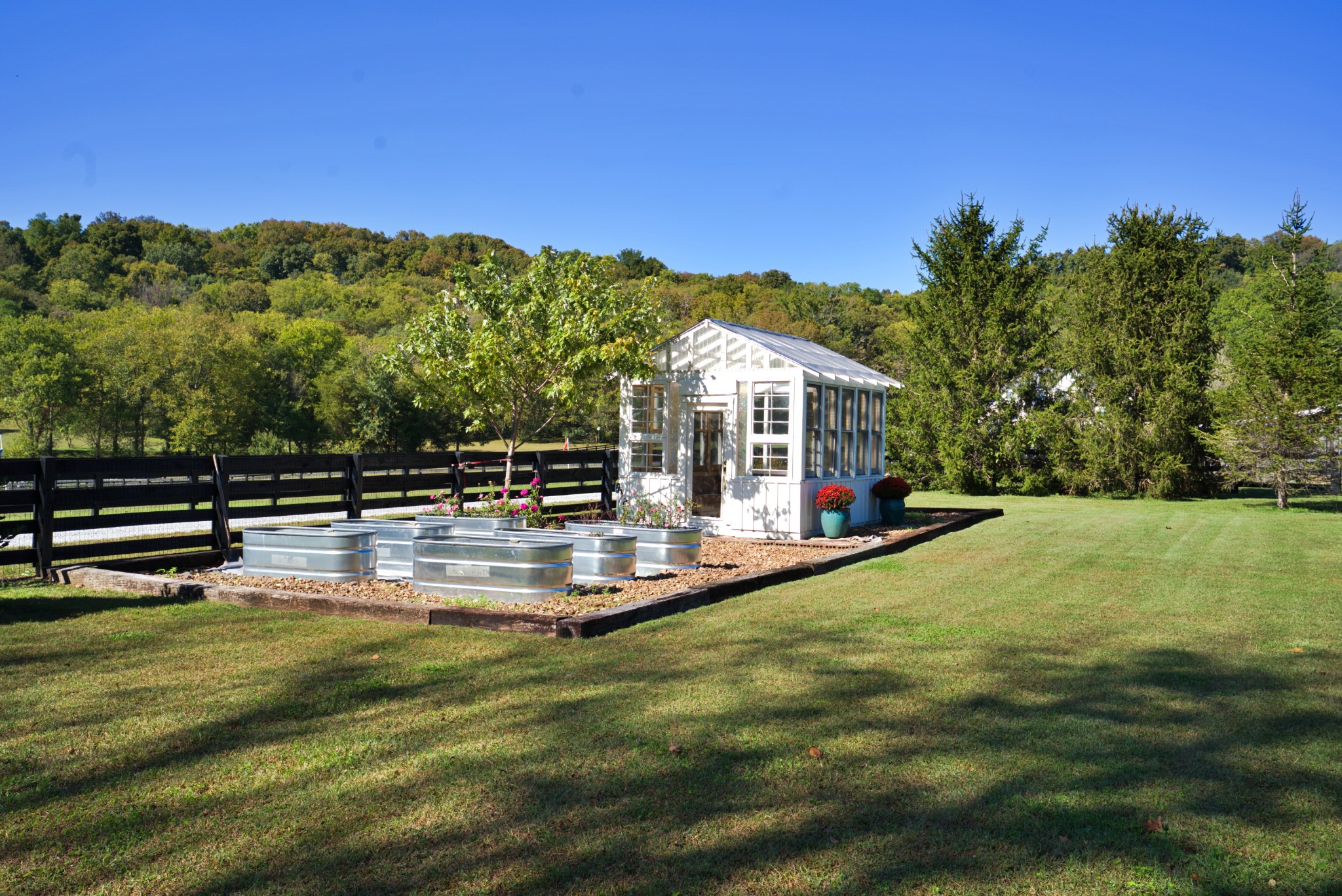 1496 Coleman Road Franklin, TN 37064 - Photo 51 of 82 a view of a swimming pool with a garden