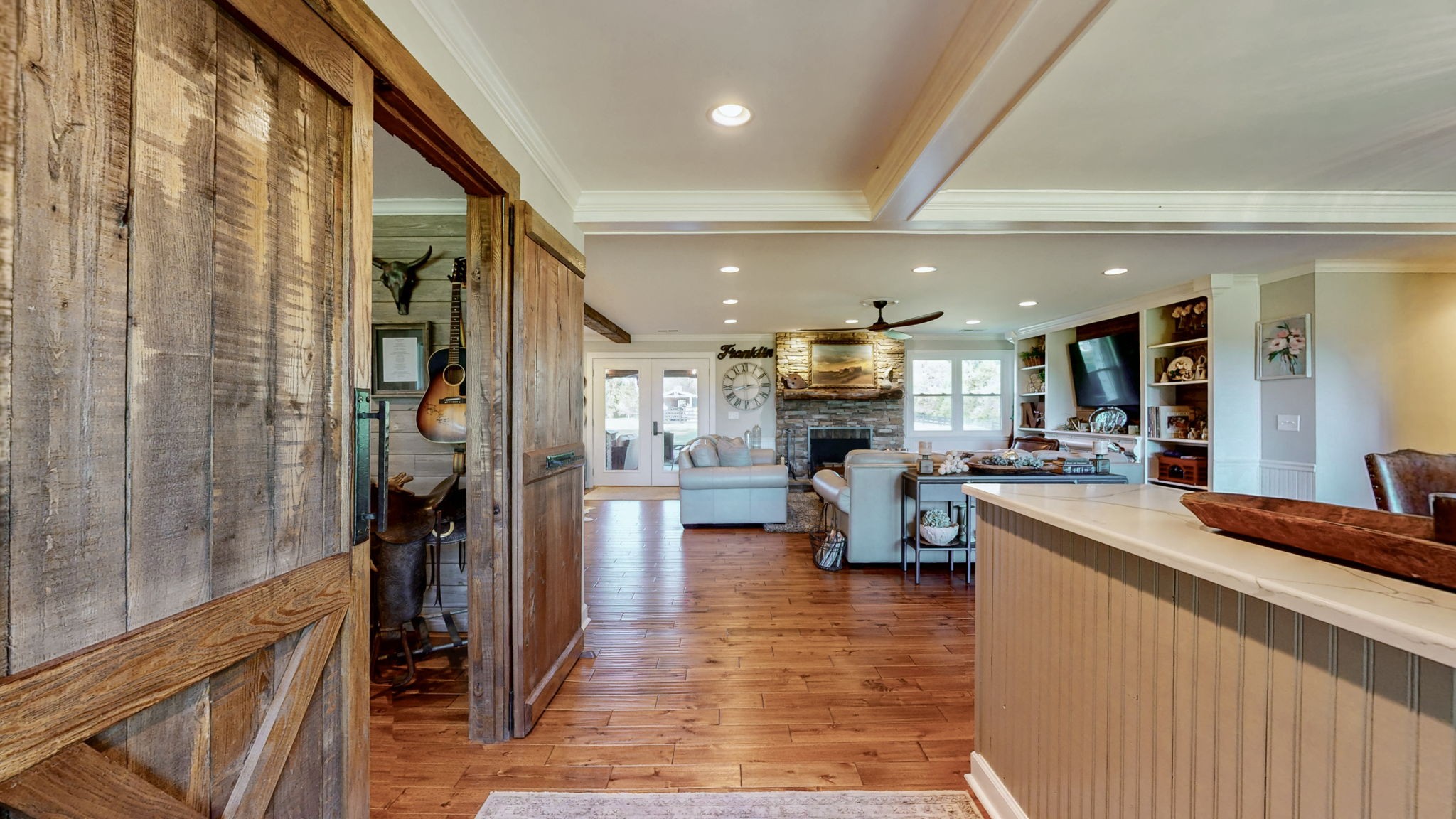 1496 Coleman Road Franklin, TN 37064 - Photo 6 of 82 a kitchen view with stainless steel appliances refrigerator oven stove dining table and chairs