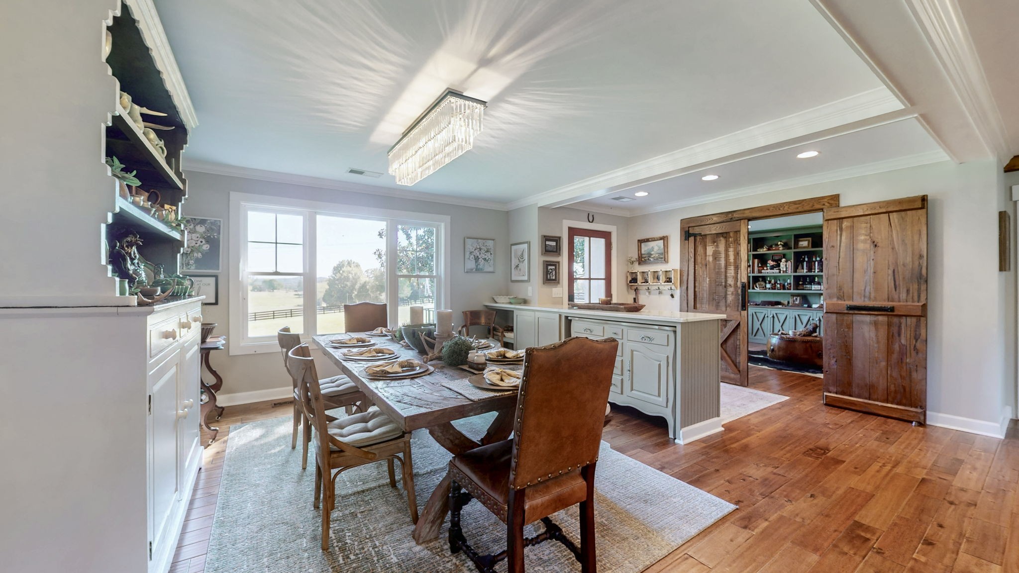 1496 Coleman Road Franklin, TN 37064 - Photo 8 of 82 a view of a dining room with furniture window and wooden floor