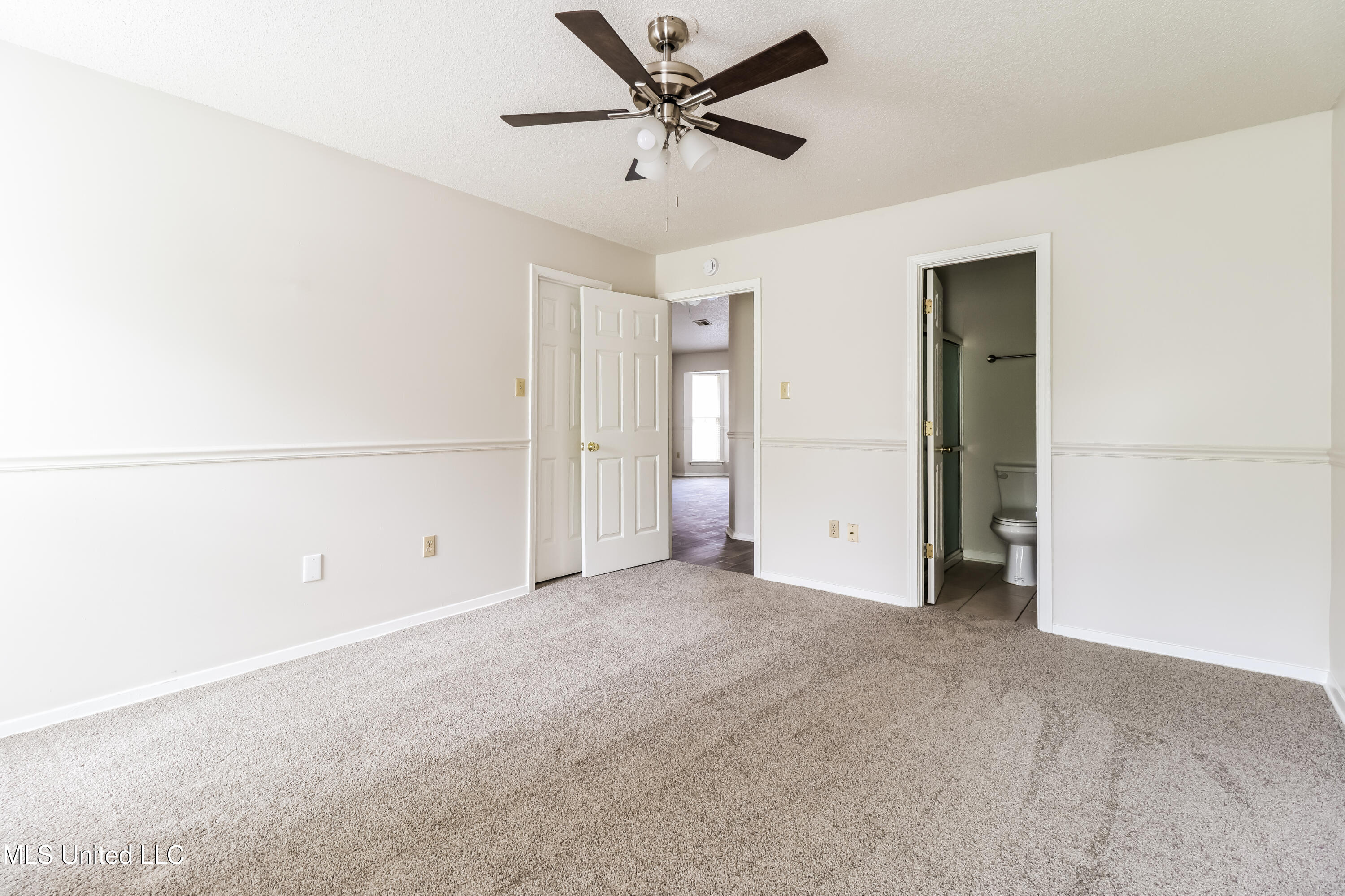 7692 Lilly Lane Southaven, MS 38671 - Photo 7 of 16 007-photo-primary-bedroom-14482915