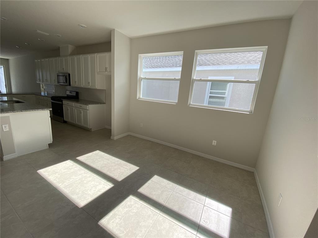 5659 Del Coronado Drive Apollo Beach, FL 33572 - Photo 4 of 9 a living room with furniture and a window