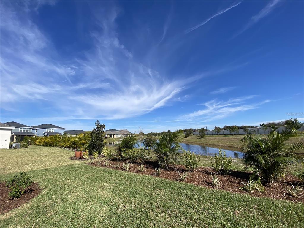 5659 Del Coronado Drive Apollo Beach, FL 33572 - Photo 6 of 9 a view of a lake with sunset
