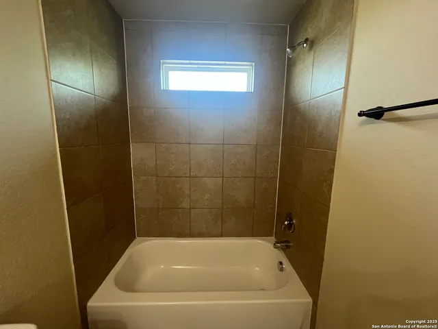 a bathroom with a tub