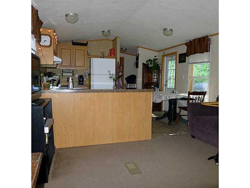 41 Federal Road Livermore, ME 04253 - Photo 8 of 34 LR to kitchen/dining.