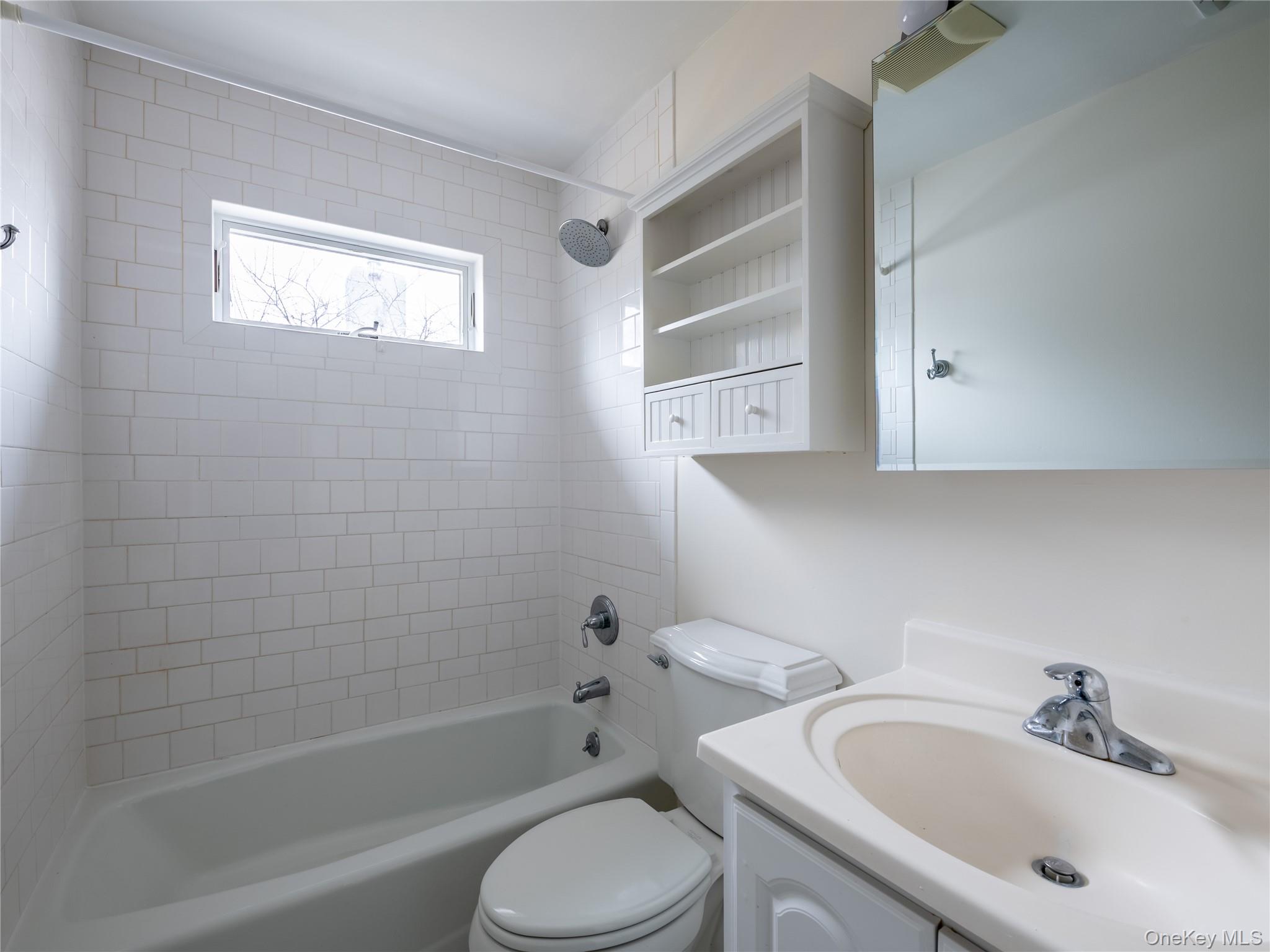 21 Marwood Road North Port Washington, NY 11050 - Photo 35 of 35 a bathroom with a sink toilet and shower