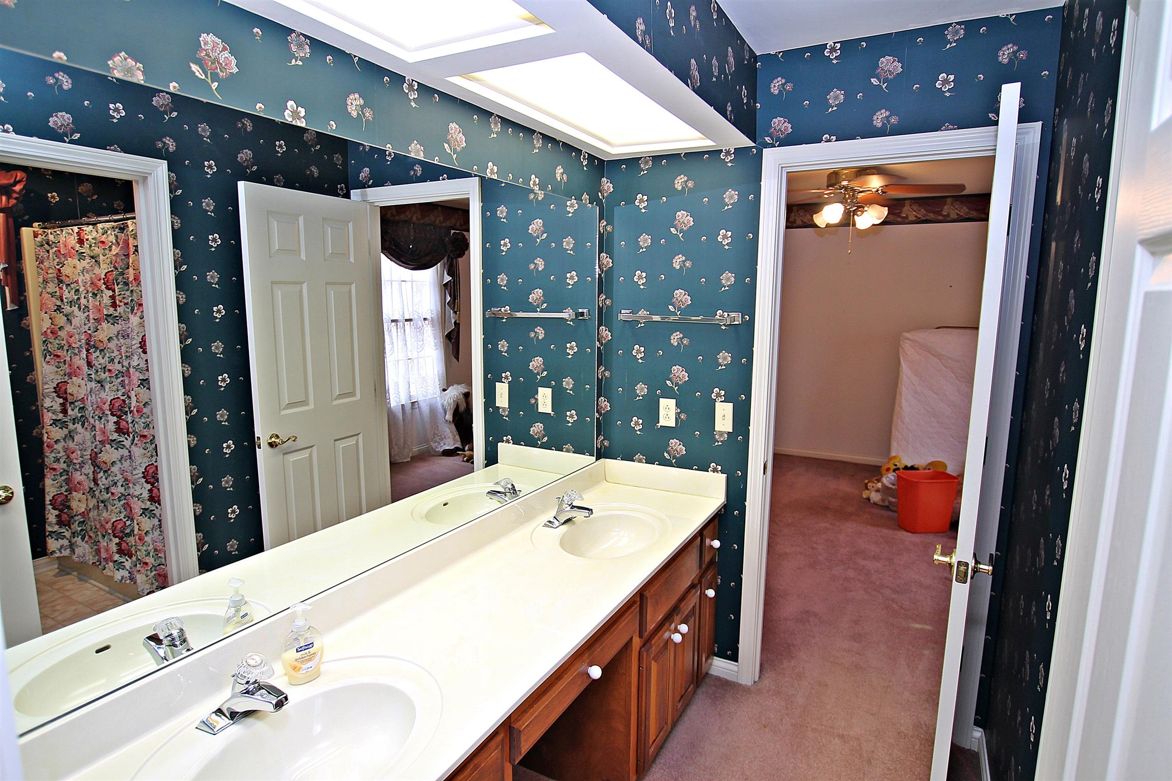 1012 Laura Lane Springfield, TN 37172 - Photo 18 of 30 a bathroom with a sink and mirror