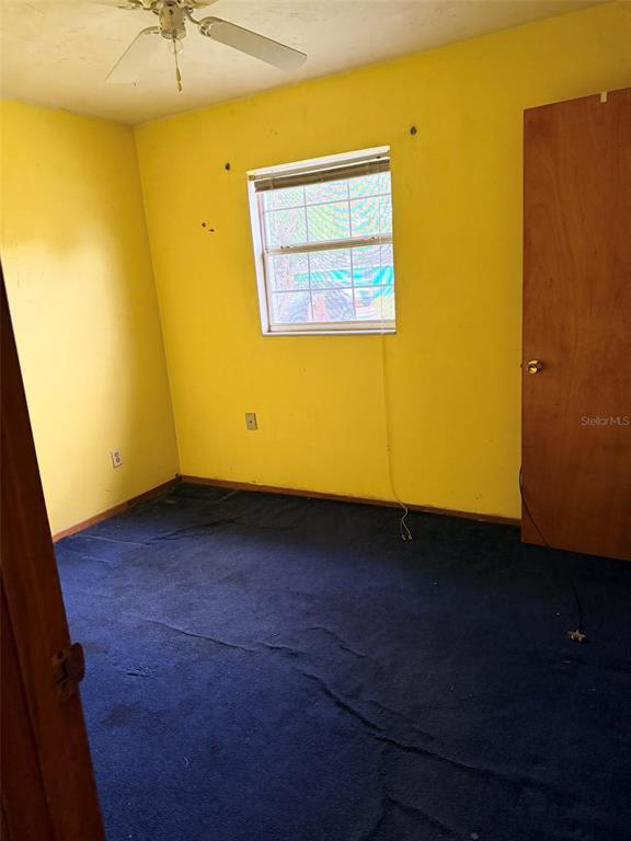 2114 Southwest 7th Street Ocala, FL 34471 - Photo 8 of 10 a view of an empty room