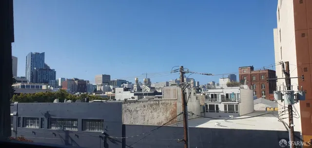 a view of a city with tall buildings