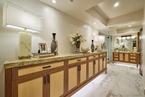 a spacious bathroom with a double vanity sink and a mirror