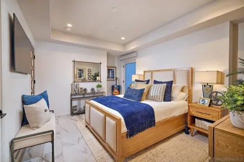 a bed room with a bed and a couch